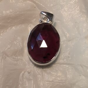 Elegant Sterling Silver and Garnet Faceted Pendant.